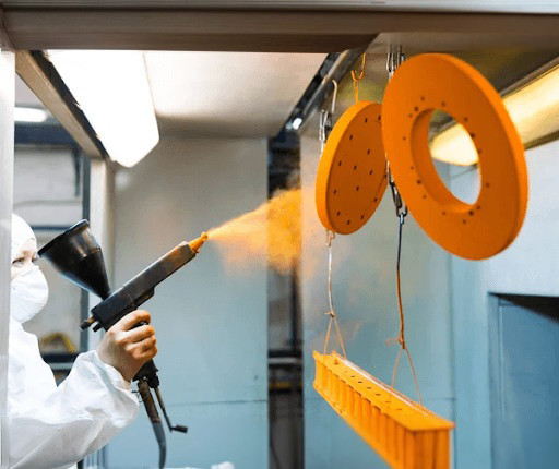 Powder coating of metal parts